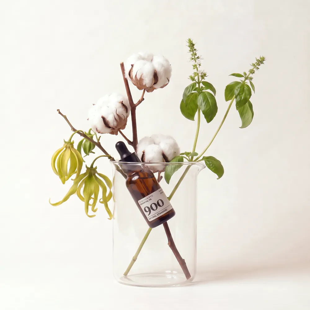 Essential Oil Blend No.900, Nine Zero Zero · bottle arranged with ingredients | Lê Mai