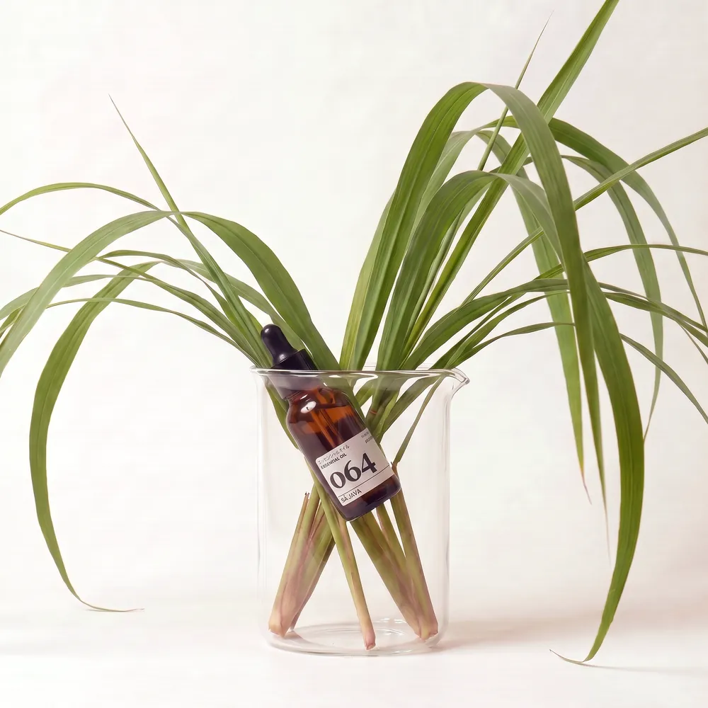 Citronella Essential Oil No.064 · essential oil bottle in an ingredient glass | Lê Mai