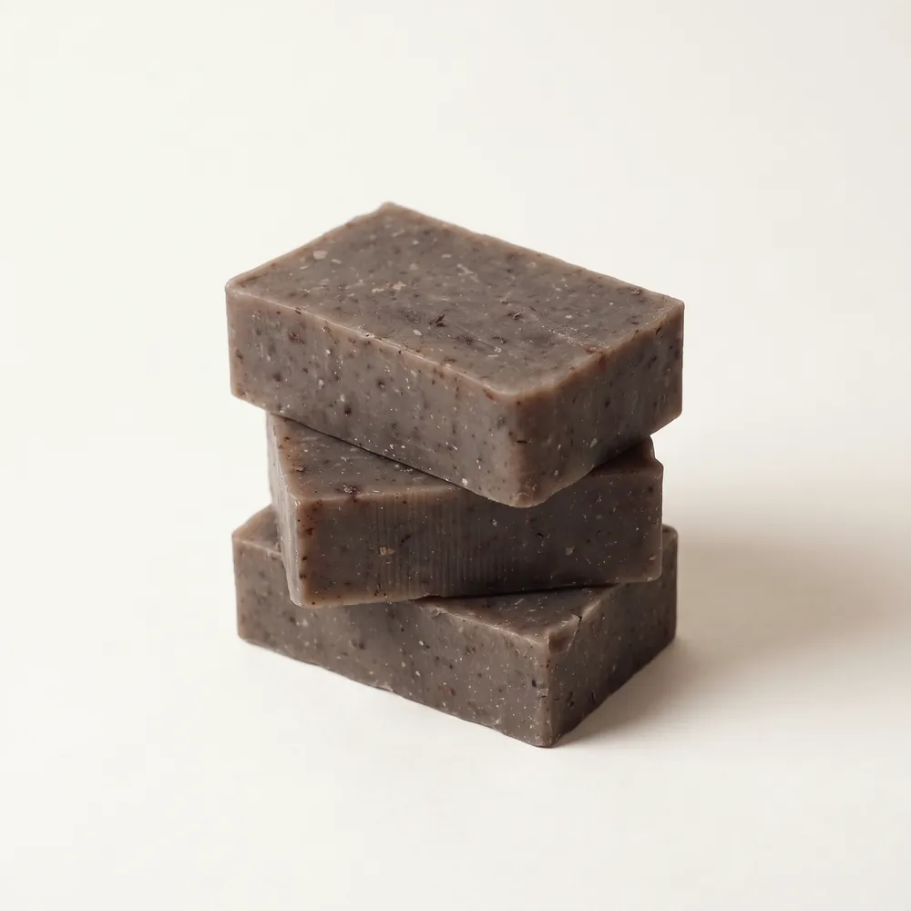 Tamanu – Neem Leaf Artisanal Soap No.096 · three stacked soap bars | Lê Mai