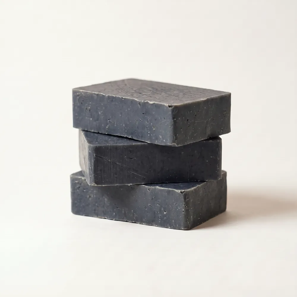 Mugwort Artisanal Soap · three stacked soap bars | Lê Mai