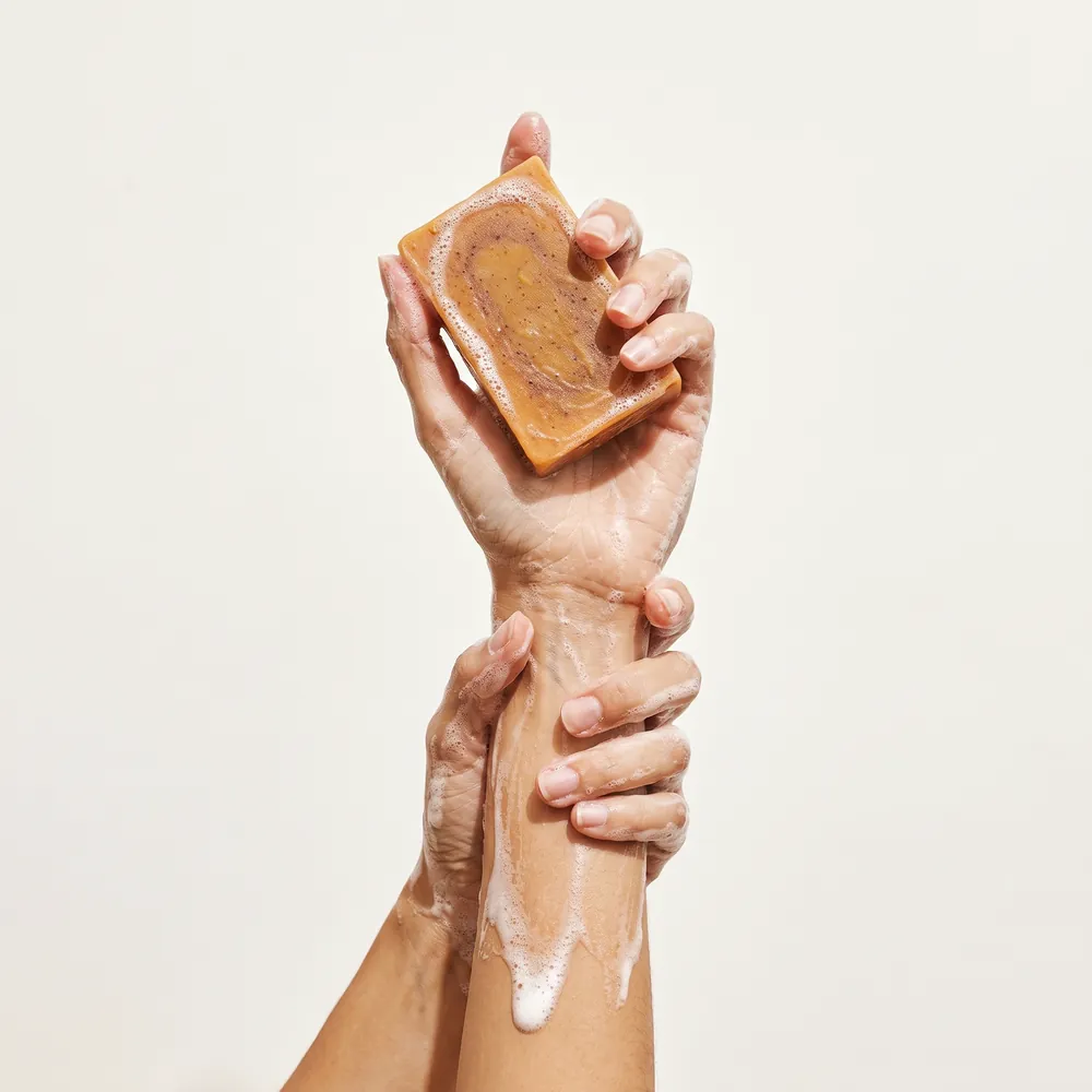 Turmeric – Beer Artisanal Soap No.093 · hand lathering the soap bar | Lê Mai