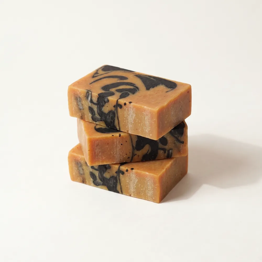 Lemongrass – Activated Charcoal Artisanal Soap No.061 · three stacked soap bars | Lê Mai